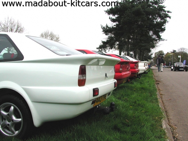 Quantum Sports Cars Ltd - Coupe. Rear end line up of coupes